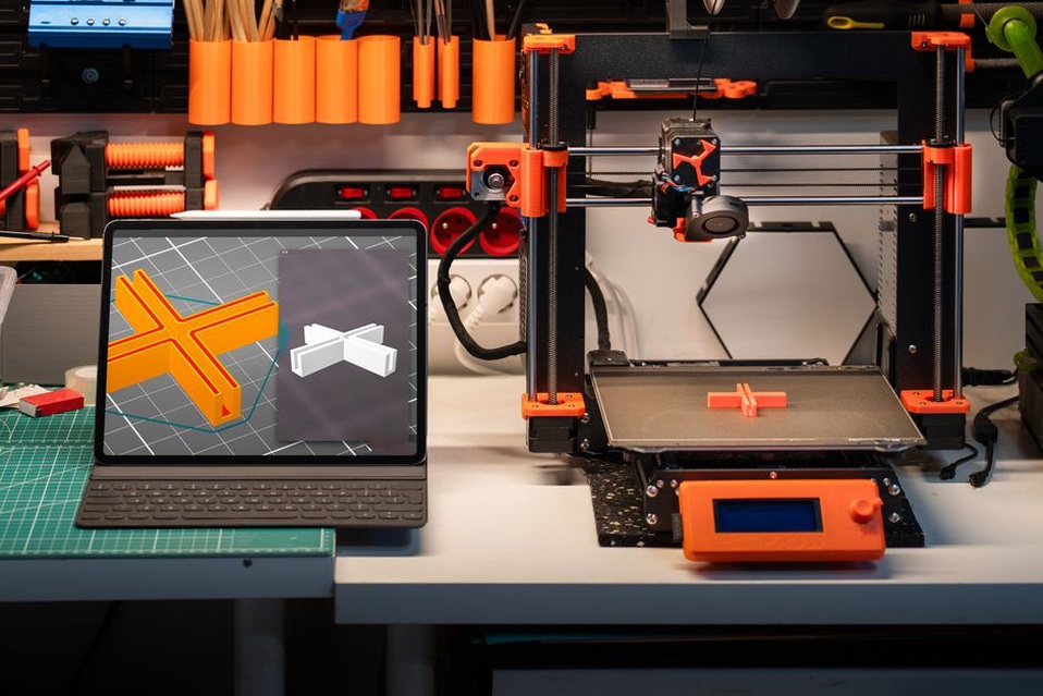 A computer screen showing a 3D model being reconstructed from multiple images