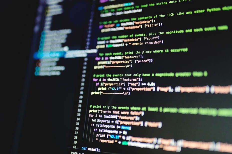 Atom XML source code showing a feed entry with author and category elements