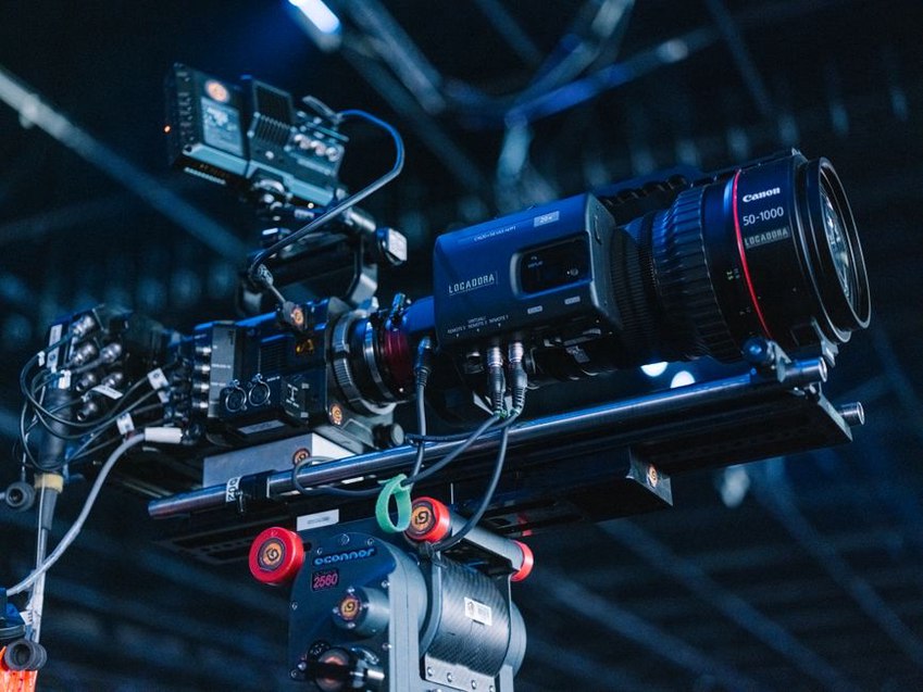 Lab setup with a high-speed camera and calibration grid used for 120fps motion capture