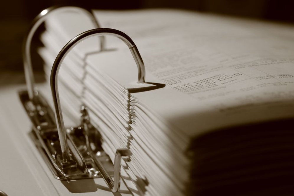 LaTeX class file header showing conference-specific formatting commands