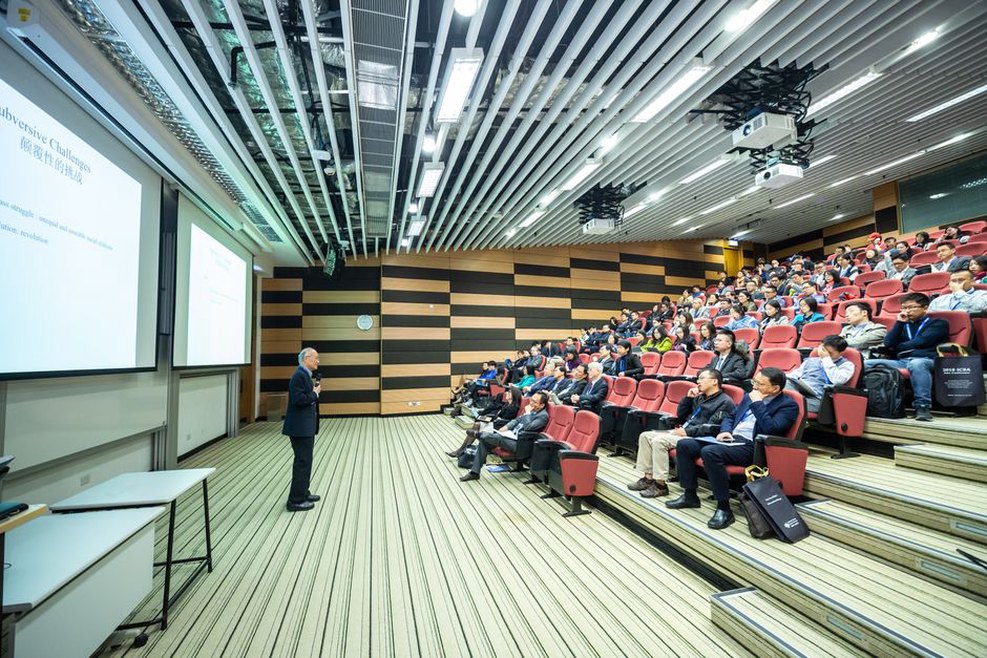 Researchers compare speech recognition results during a conference session