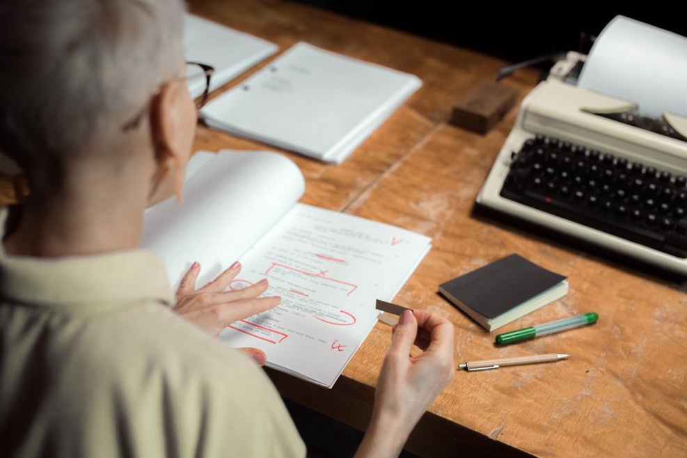 An operator checks uncertain text against a scan