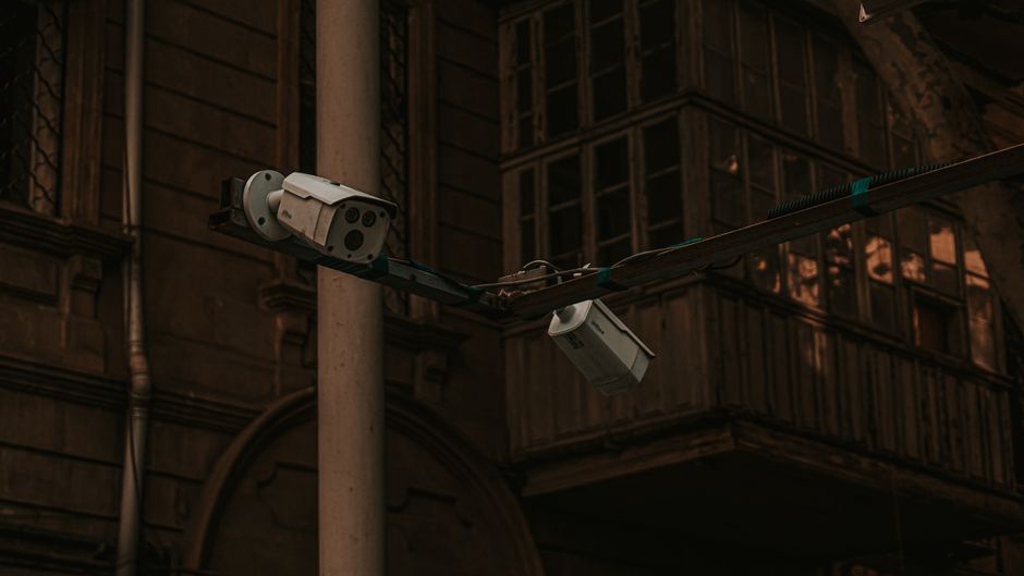 Multiple pedestrians appear across a surveillance display
