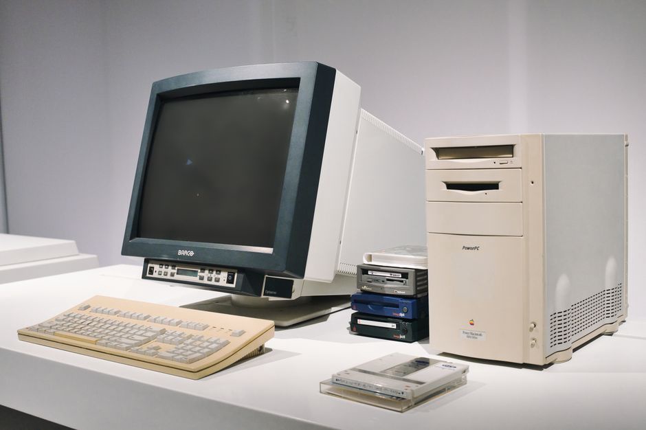 A university speech lab from the early 2000s equipped with microphone arrays and CRT workstations
