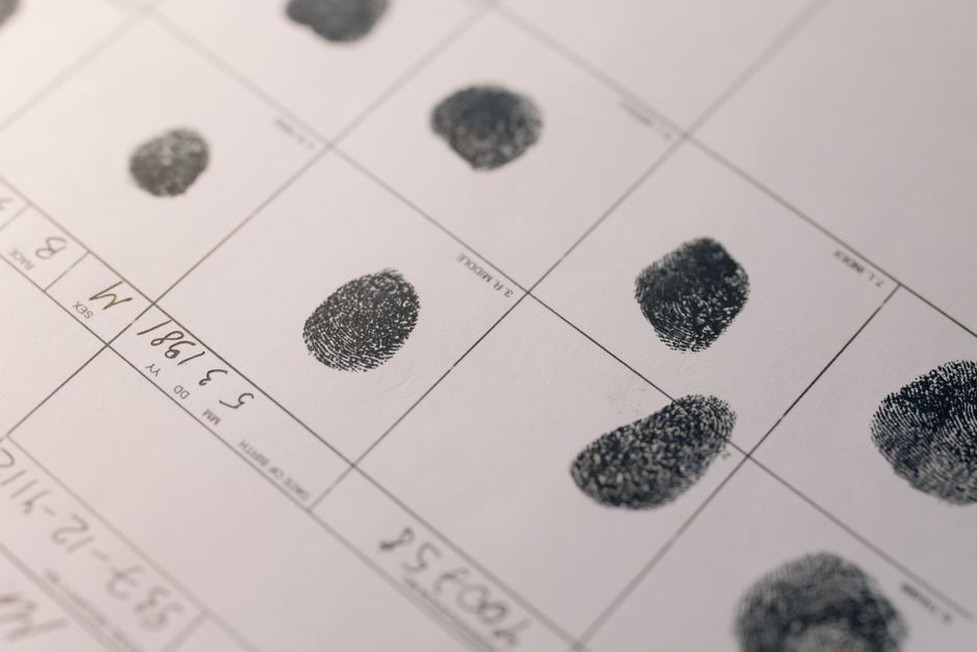 A researcher tests a fingerprint capture device