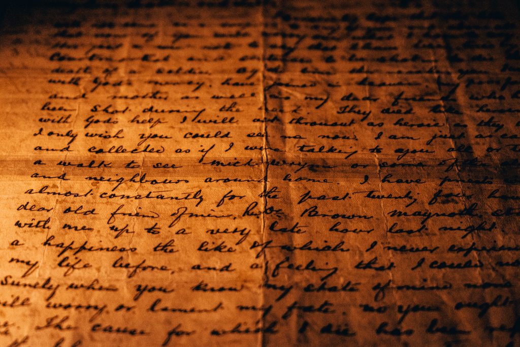 A close view of a handwritten archival document being processed by optical character recognition