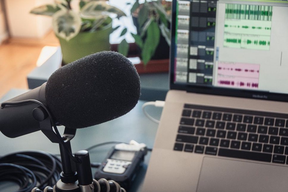 A researcher annotates multilingual speech recordings