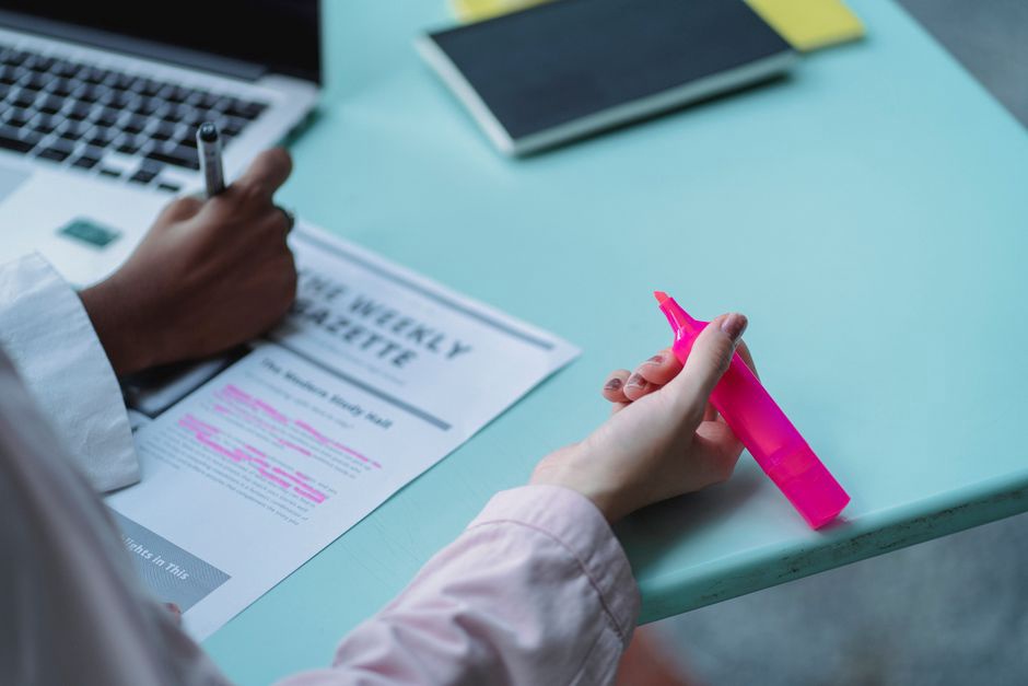 Source notes beside a draft article schedule