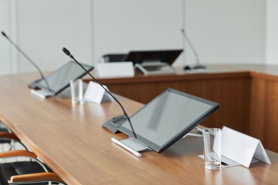 Table microphones used to capture group conversation
