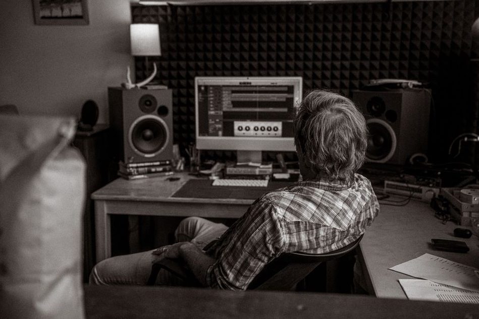 Researcher examining a recorded speech waveform