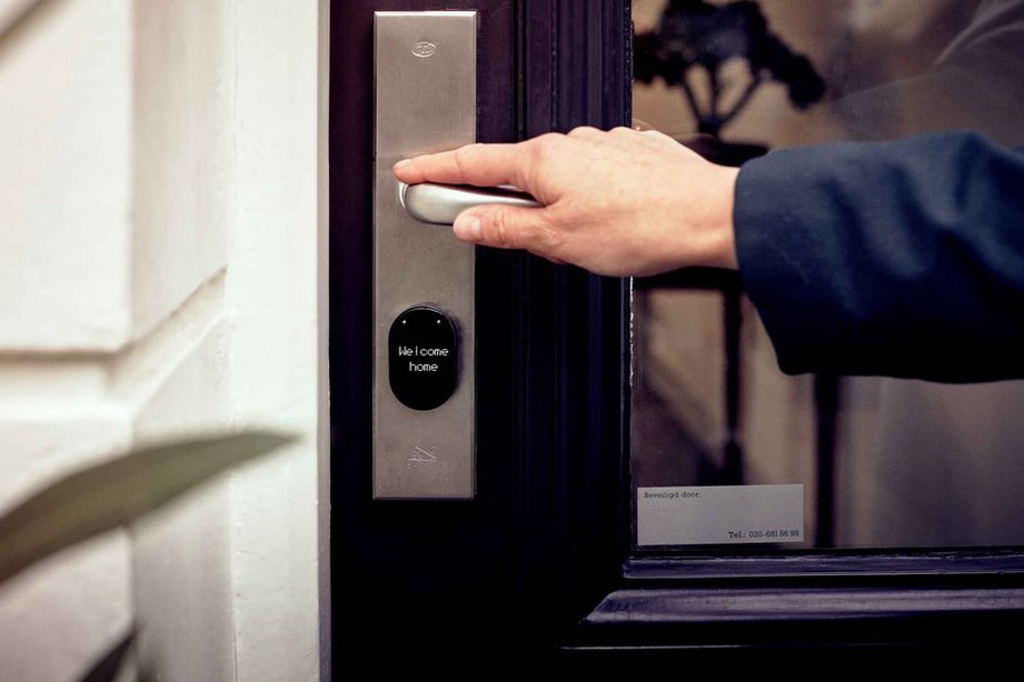 Fingerprint reader beside an office entrance