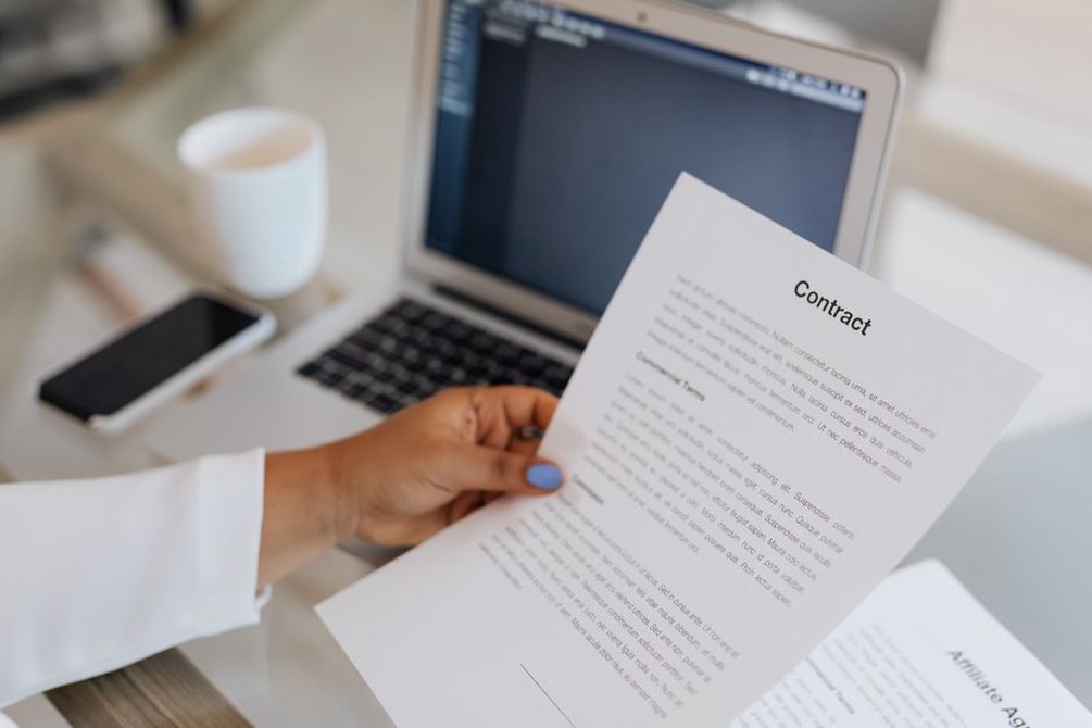 Corrections being checked against a scanned page