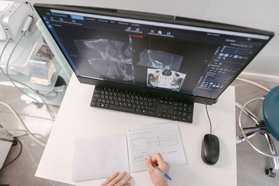 Radiologist examining a highlighted region on a scan