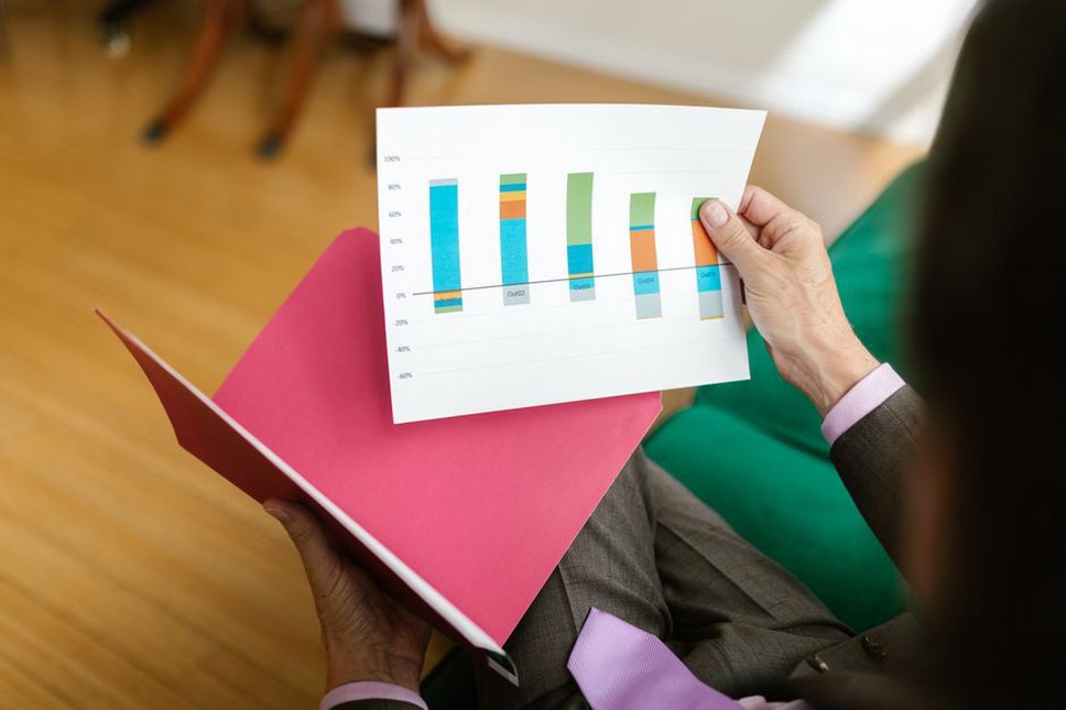 Results tables and handwritten notes under review