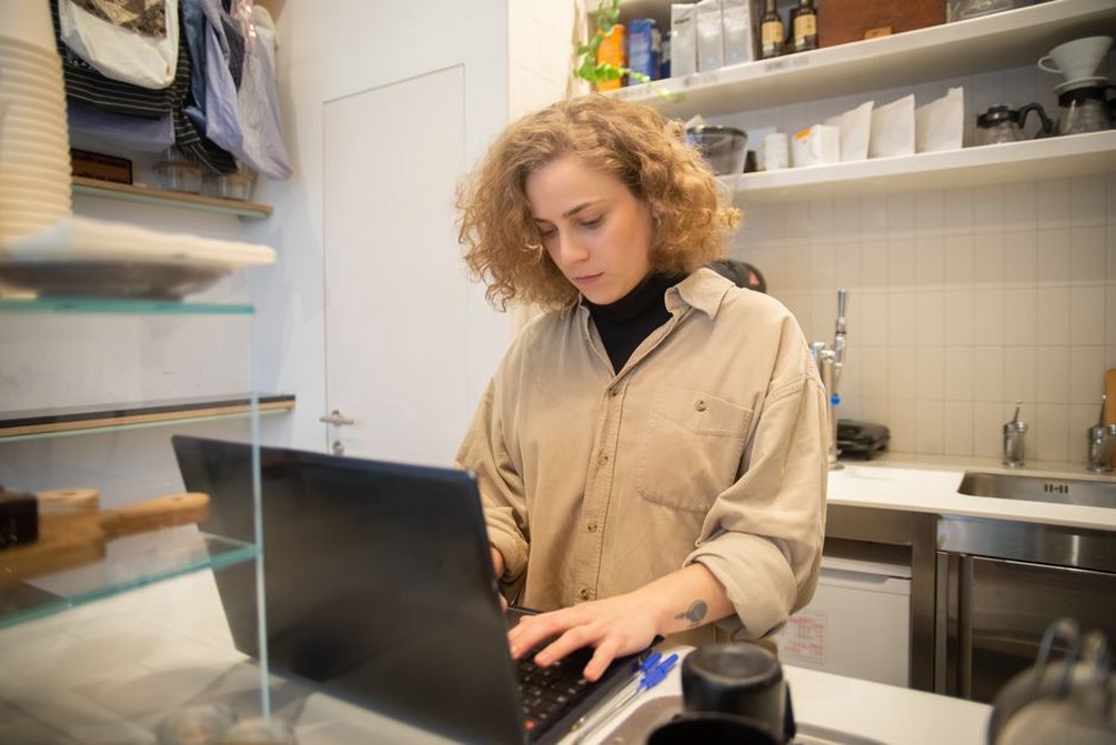 Owner checks business hours and address online
