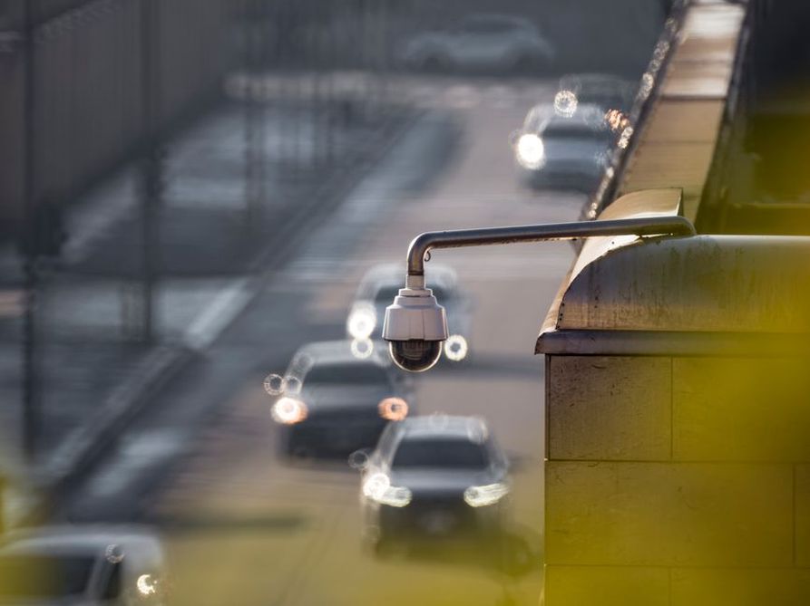 Several vehicles cross a camera's field of view