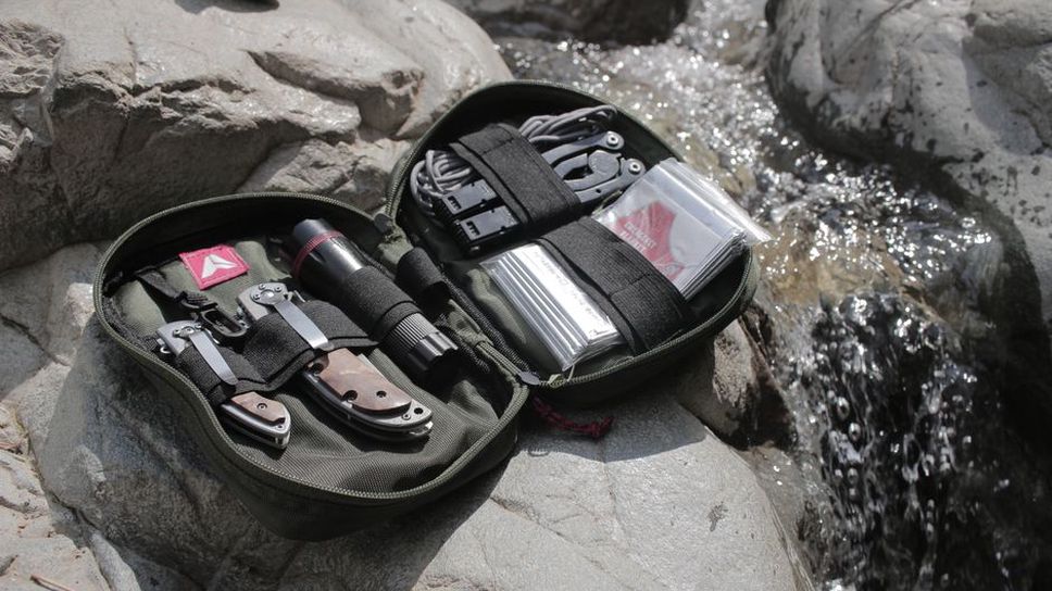 Documents and small essentials ready for a portable bag
